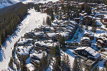 An aerial view of a ski resort covered in snow