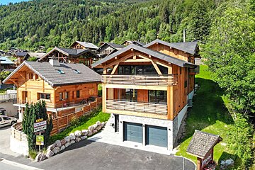 A large house with a sign that says maison on it