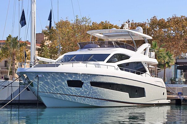 A white yacht with the number 14 on the side
