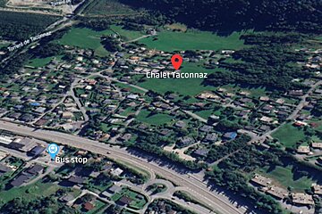 An aerial view of chalet taconnaz and a bus stop