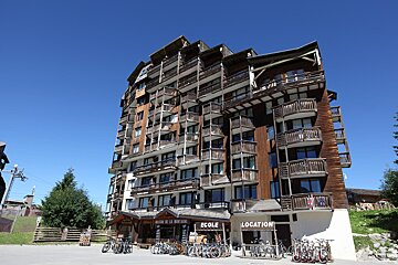 A building with a sign that says location on it