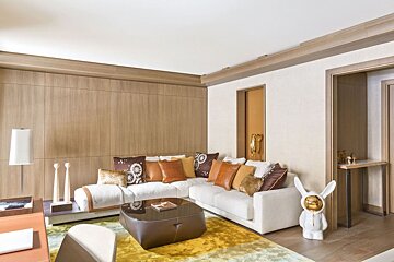 A living room with a couch and a coffee table