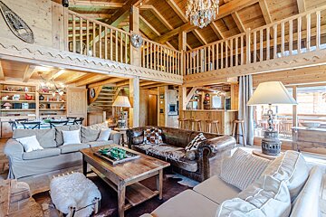 A living room with a couch and a coffee table