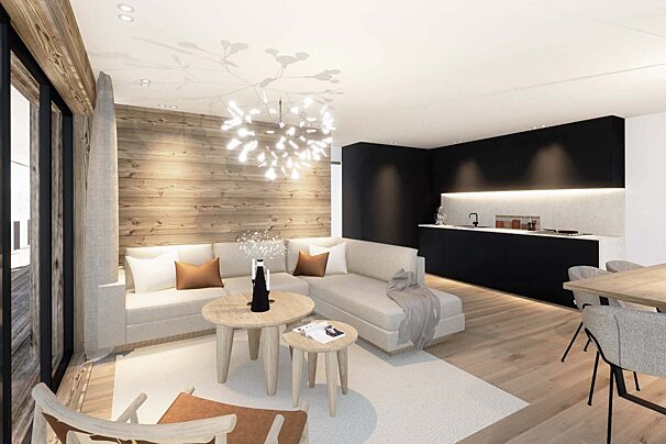 Stylish modern living room/kitchen with a rustic wood wall, black kitchen, light sectional sofa, and an artistic chandelier.