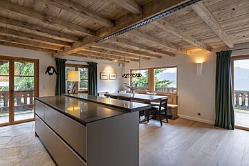 A kitchen with a stainless steel counter top