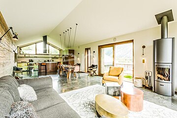A living room with a fireplace and a couch
