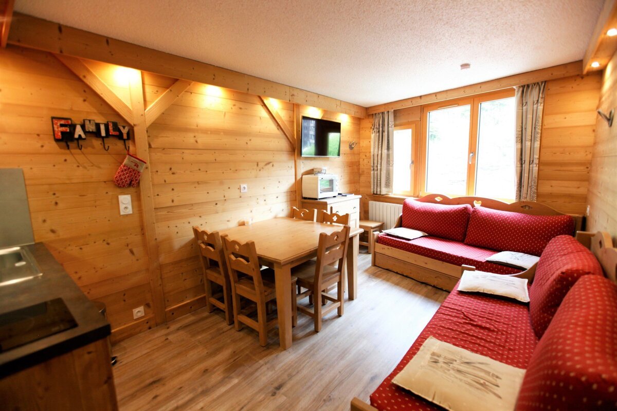 A living room with a sign that says family on it