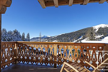 The word alpine that is on a balcony