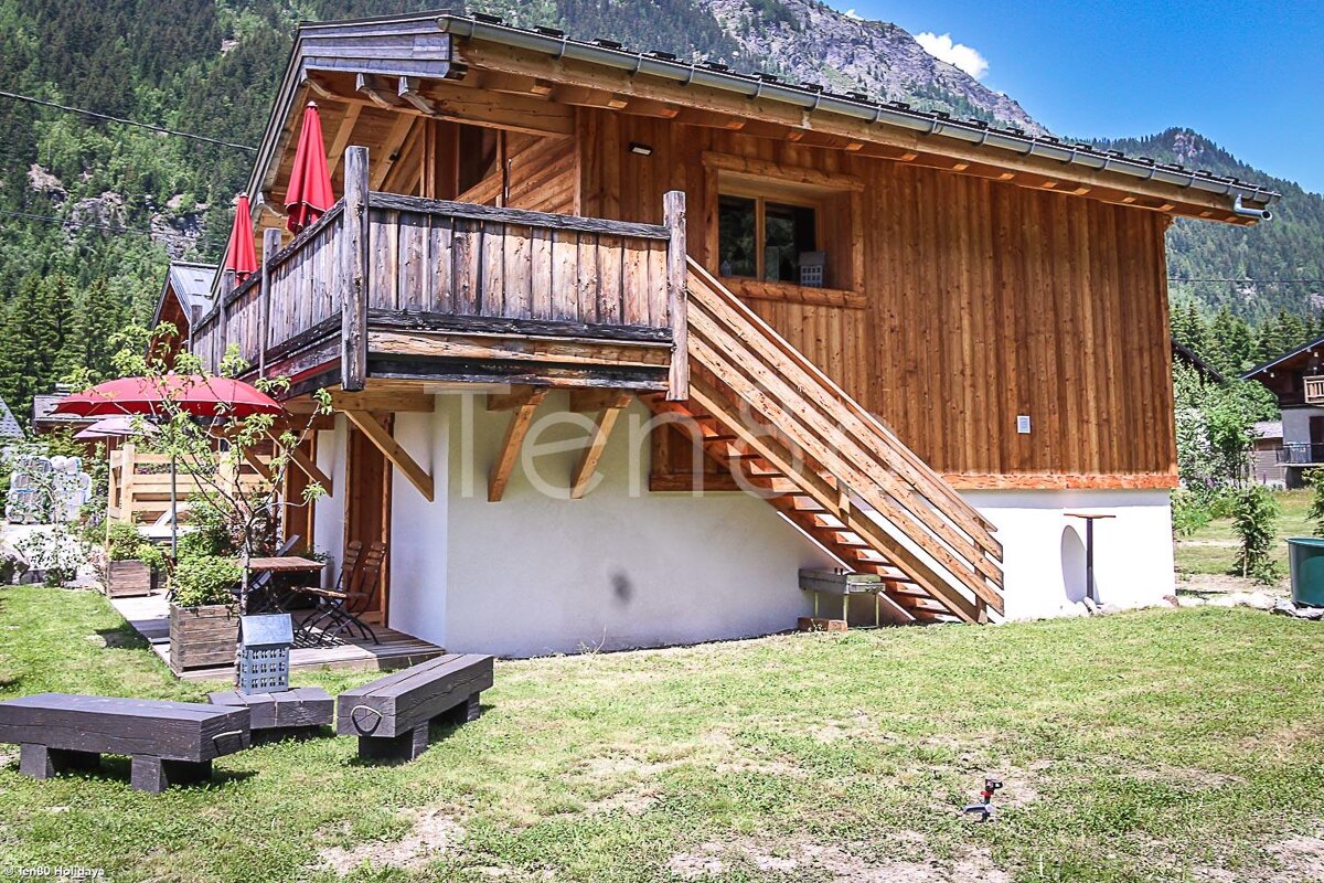 A small wooden house with the word tent on the side