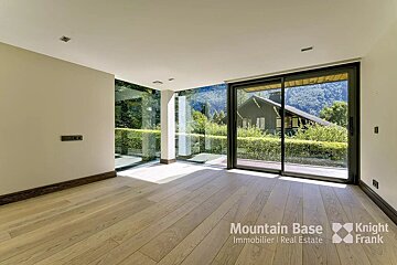 A room with a lot of windows and the words mountain base on the bottom