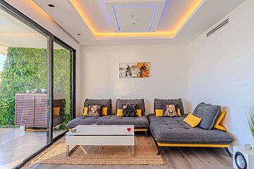 A living room with a couch and a coffee table