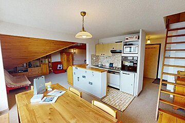 A kitchen with a box that says