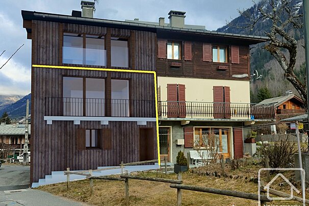 A house with a new dark wood extension (yellow line) attached to an older, lighter section with red shutters. Mountains in the background.