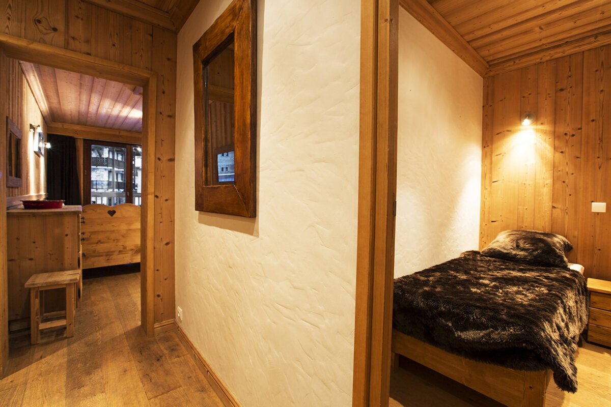 A living room with a couch and a table