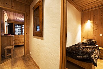 A living room with a couch and a table