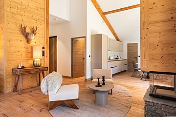 A bedroom with bunk beds and a mirror on the wall