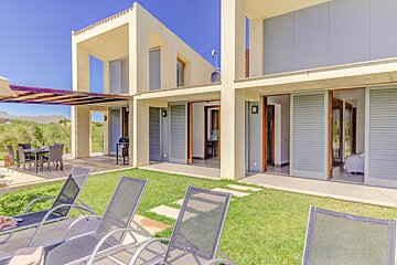 A house with a lot of sliding glass doors