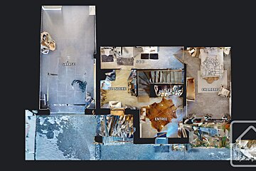 An aerial view of a house with the word entree visible