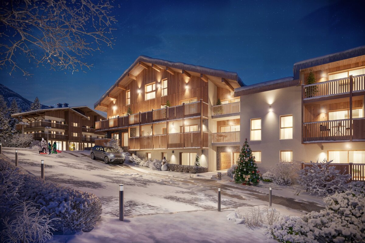 A festive winter night in a snowy mountain village. Modern wooden chalets glow warmly, featuring a Christmas tree, snowman, and a family with sleds.