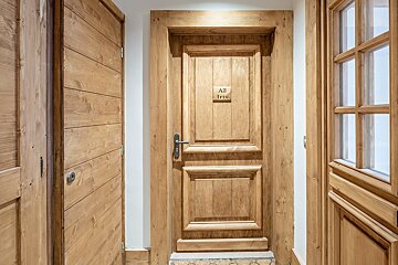 A wooden door with the number a3 on it
