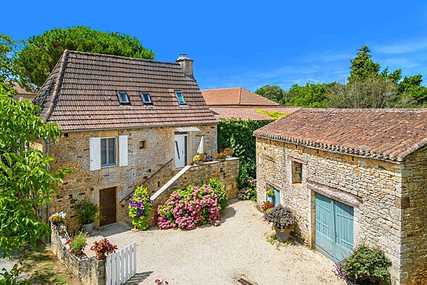 A house with a roof that has a skylight on it
