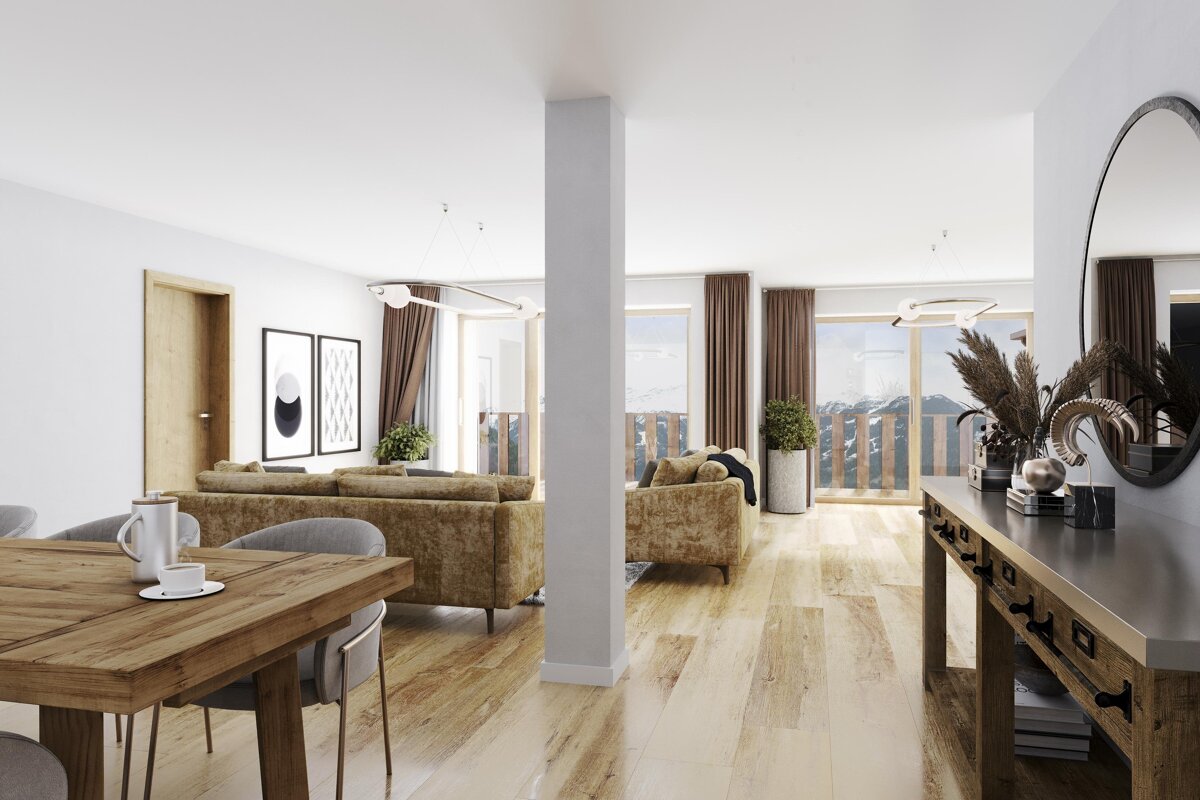 Bright, modern open-plan living space with a wooden dining table, plush tan sofas, and scenic mountain views through large windows.