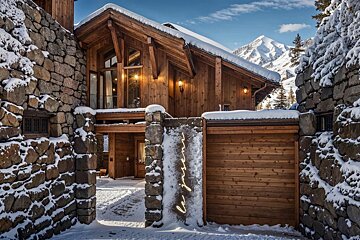 A wooden building with a sign that says le grenier
