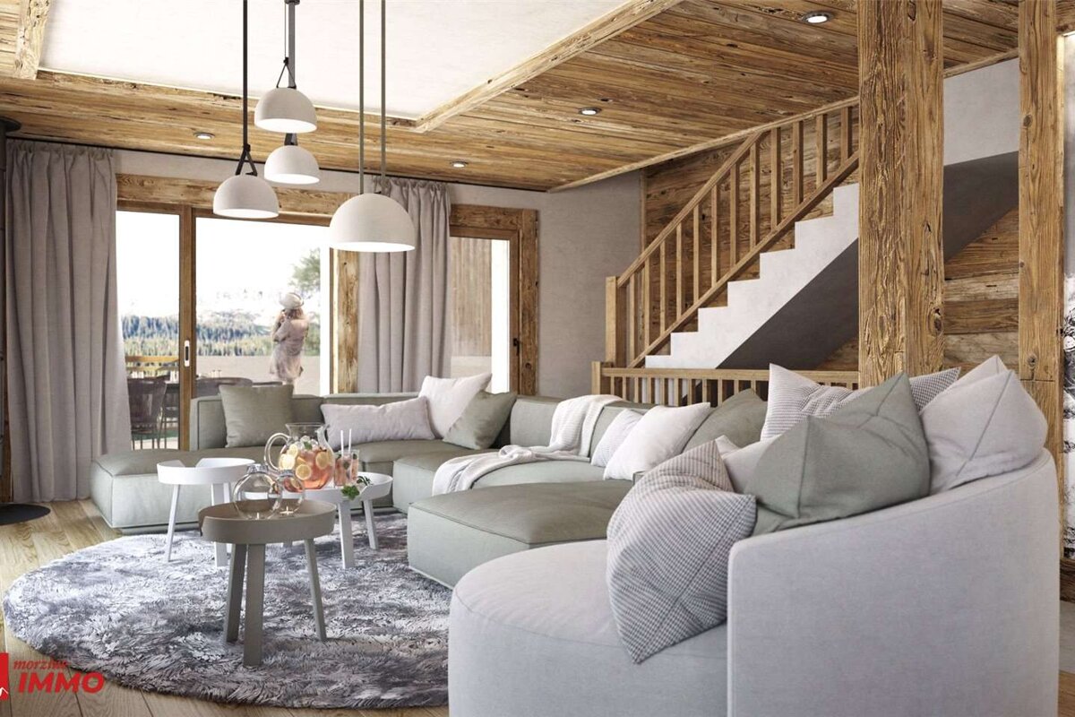A living room with a lot of furniture and a sign that says immo