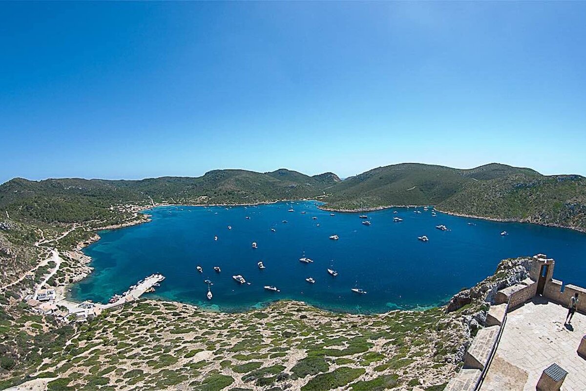 A large body of water with many boats in it