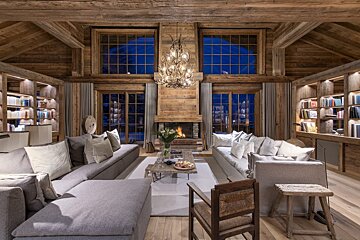 A living room filled with furniture and a fireplace