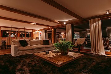 A living room with a couch and a coffee table