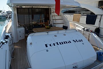 A boat with the name fortuna star on it
