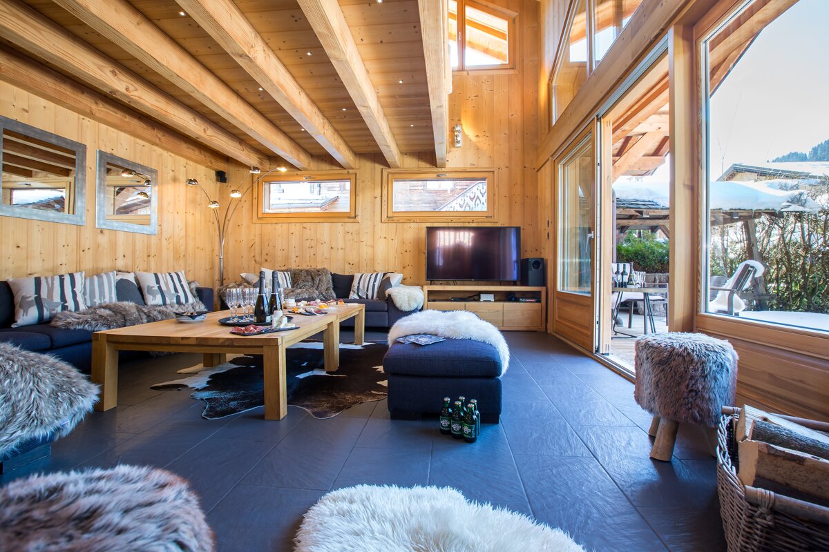 A living room filled with furniture and a flat screen tv