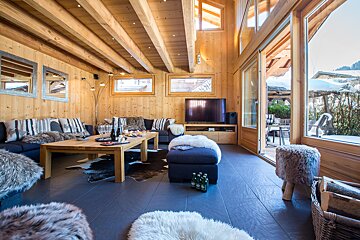 A living room filled with furniture and a flat screen tv