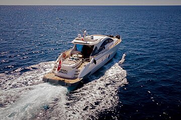A boat that has the word baby on the back of it