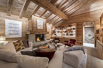 A living room with a fireplace and a couch