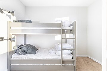 A bunk bed with the word armor on it