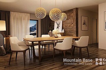 A dining room with a table and chairs and a sign that says mountain base