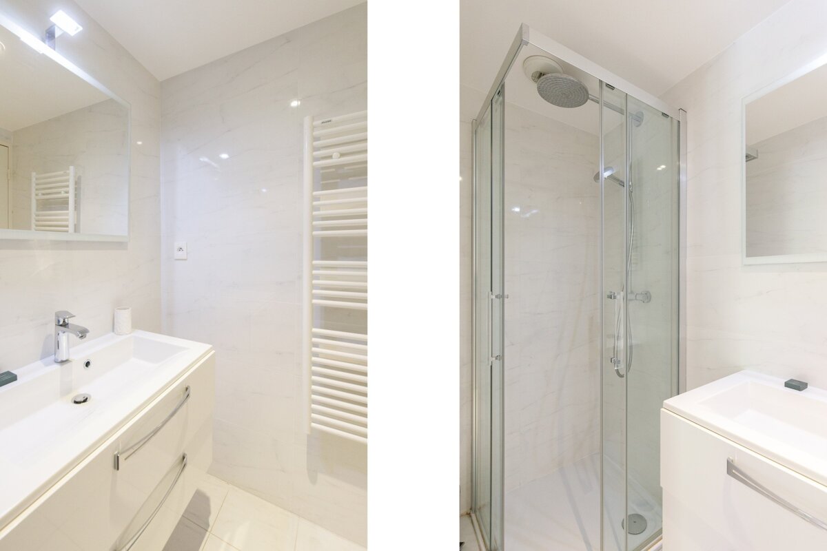 A bathroom with a sink and a walk in shower