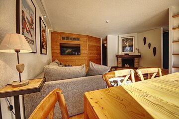 A living room with a poster on the wall that says north america