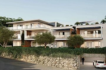 A modern, multi-story building with glass balconies and lush greenery sits above a stone wall. A white car is parked at an open garage with a person.