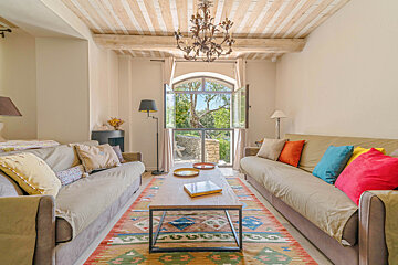 A living room with two couches and a coffee table
