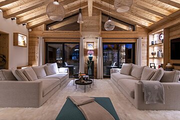 A living room with two couches and a table