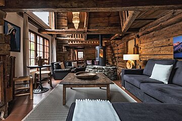 A living room with a couch and a coffee table