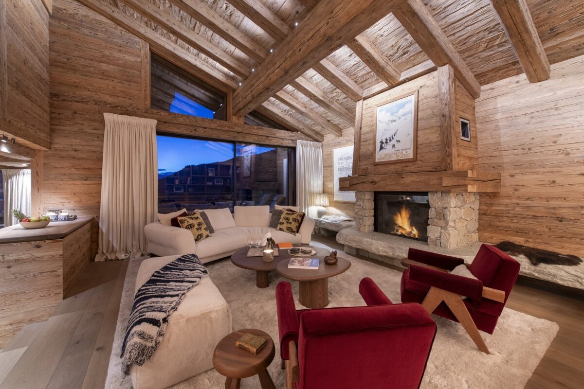 A living room with a fireplace and a couch