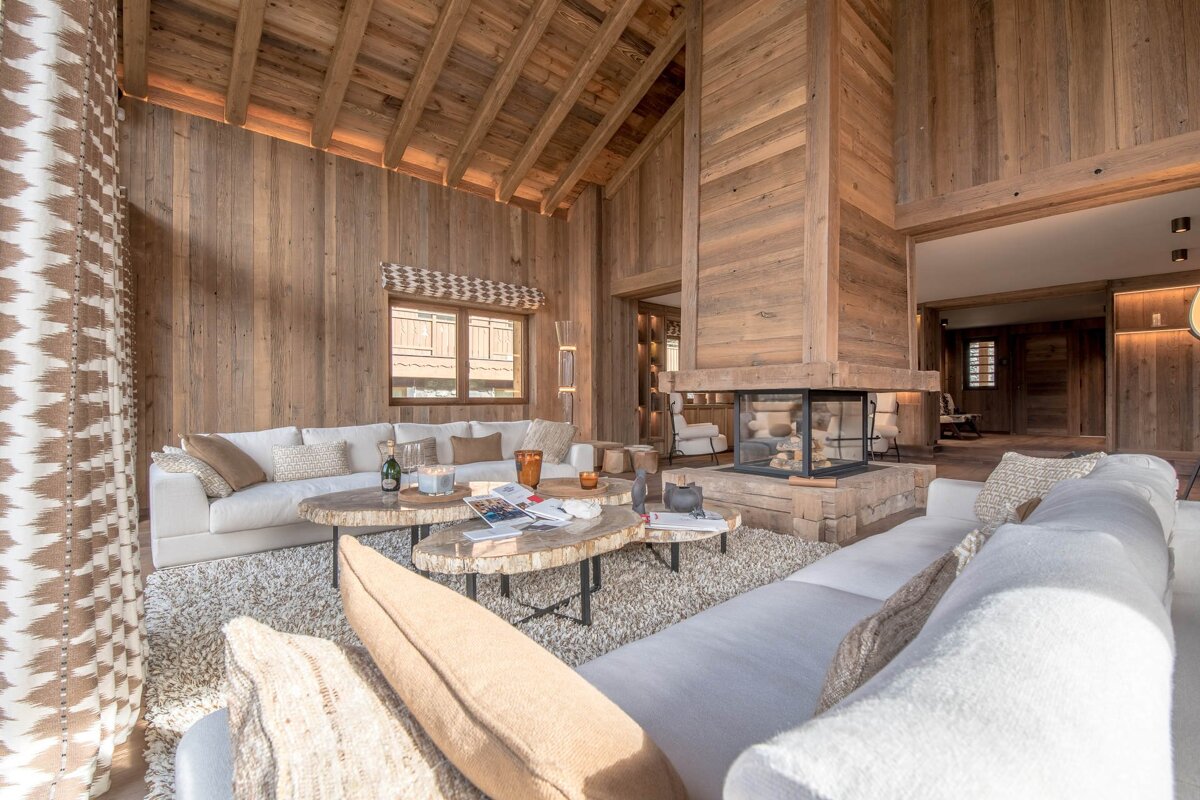 A living room filled with furniture and a fireplace