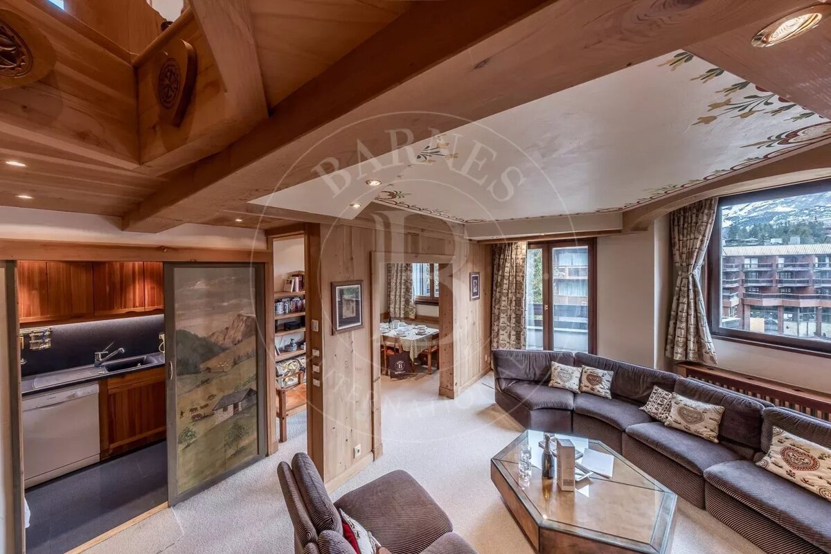 A living room with the word barnes on the ceiling