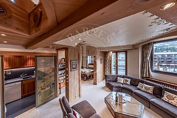 A living room with the word barnes on the ceiling