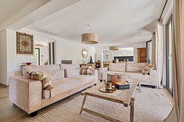 A living room with a couch and a coffee table