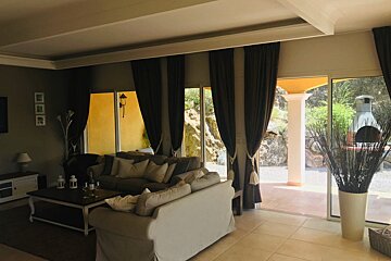 A living room with a couch and a coffee table